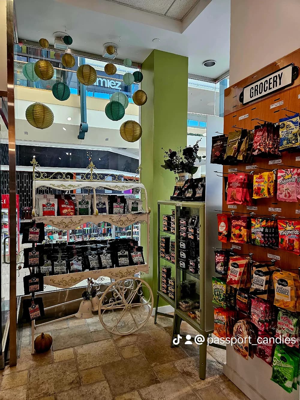 Close-up view of international candy shelves featuring Japanese, Korean, and European treats at Passport Candies